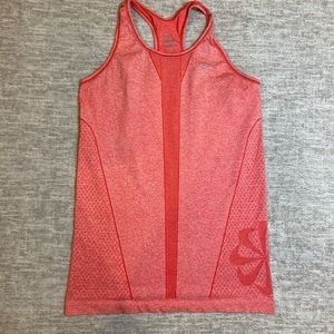 Nike women's dri-fit salmon colored razorback tank top size medium